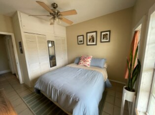 bedroom with closets and storage - 4311 Avenue Q 1/2