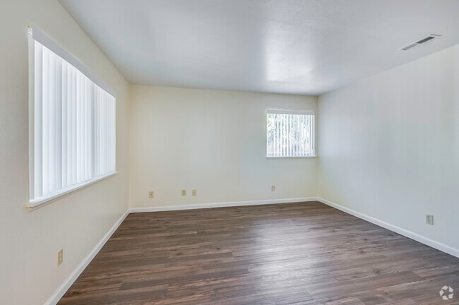 3BR, 2BA - 1150SF - Living Room - Summer Village Apartments
