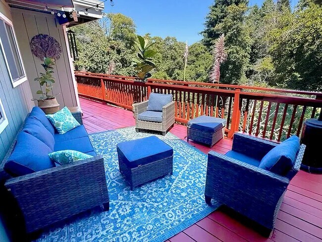 Deck looking out into trees and Soquel Creek - no neighbors to the east or north. - 3560 Paper Mill Rd
