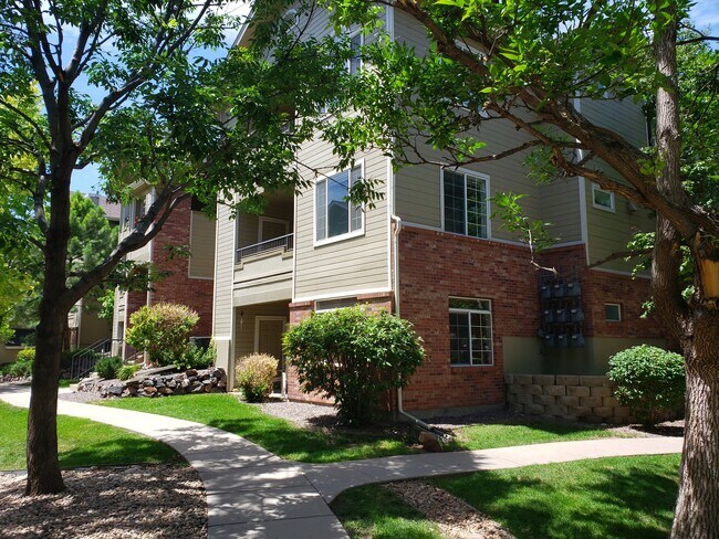2nd floor unit on corner with balcony - 8400 S Upham Way