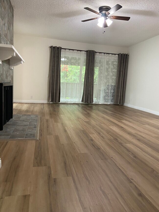 living room to patio - 1161 W Duarte Rd