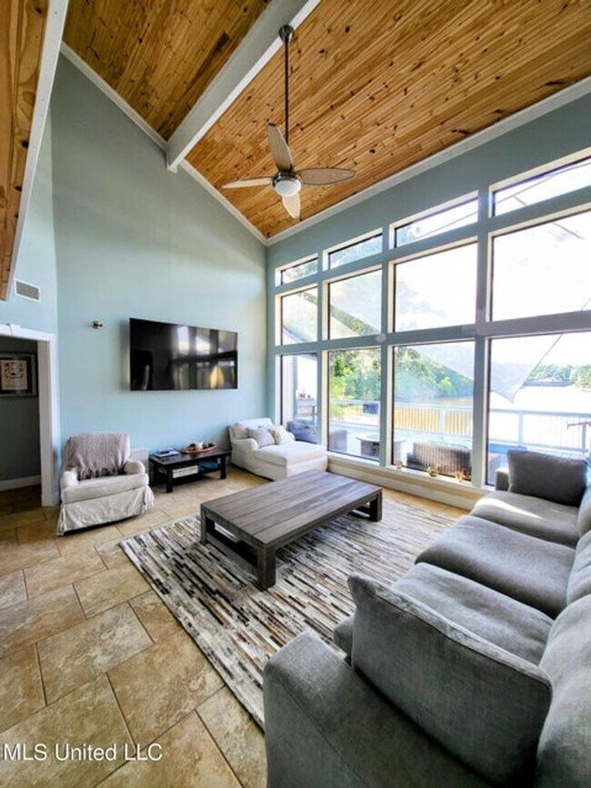 Building Photo - Riverfront Living with Private Boat Launch