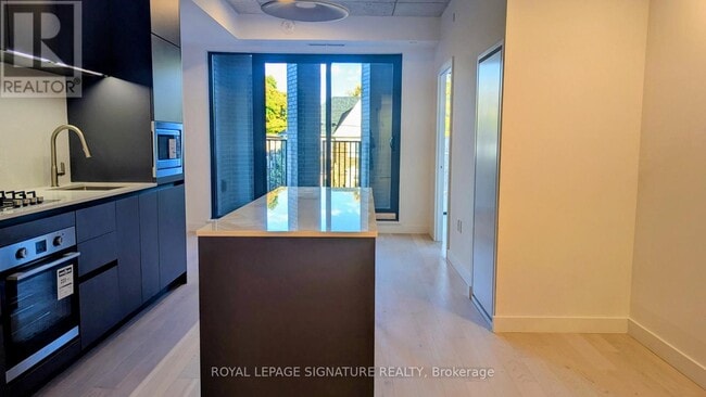 Photo du bâtiment - 1720 Bayview Ave