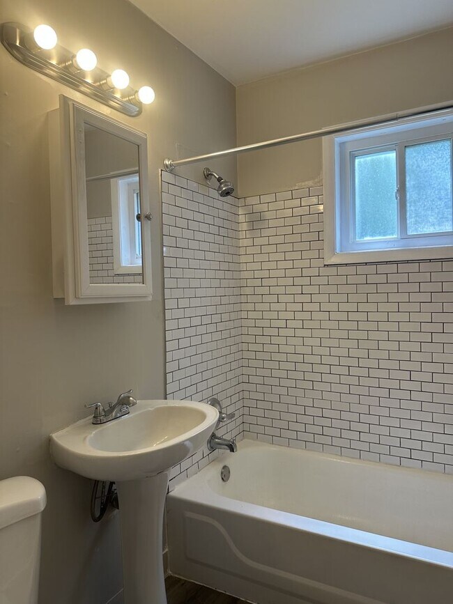 Building Photo - Three Bedroom, One Bathroom Home for rent ...