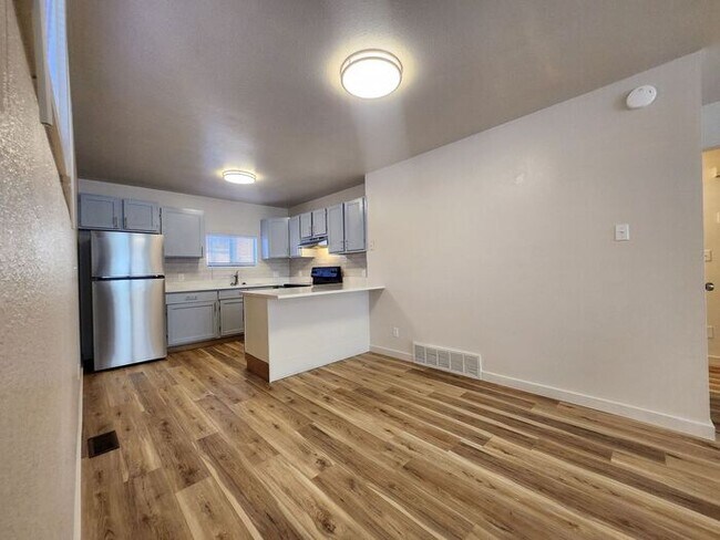 Building Photo - Renovated Cozy 2-Bedroom Duplex | Move In Now – Next Month’s Rent is Waived!