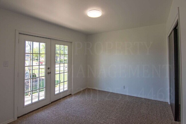 Foto del edificio - 403 W 9th St