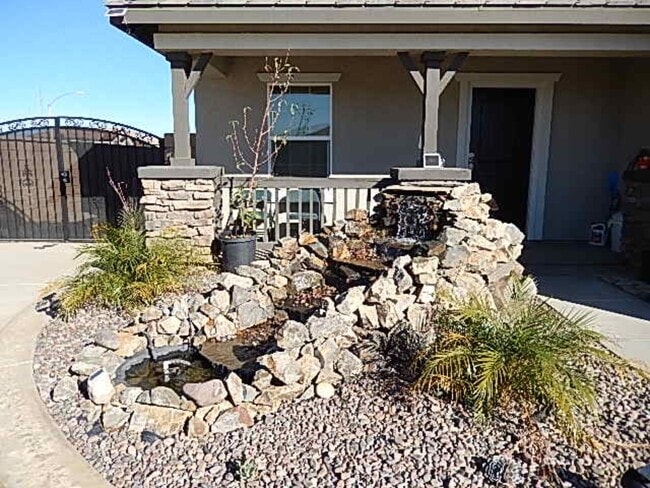 Building Photo - SOLAR HOME * CORNER HOUSE * HUGE BACK YARD * NICE PERRIS HOME.