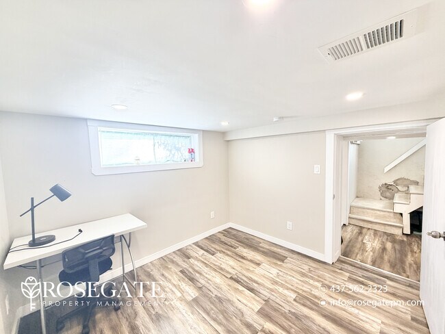 Photo du bâtiment - Cozy 2-Bedroom Basement Suite in the Heart...