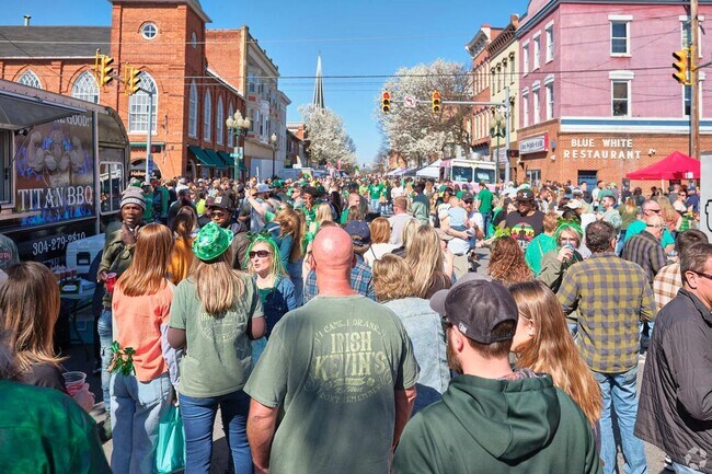 Residents fill the streets during events like the St. Patrick's Day Celebration.