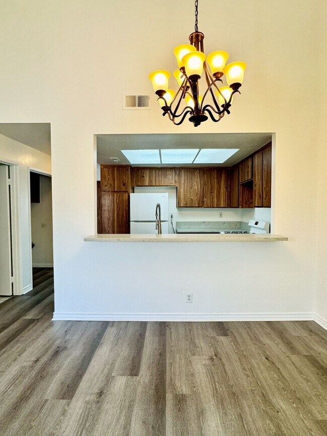 Building Photo - RENT SPECIAL!! $400 OFF SECOND MONTH RENT - Spacious 3 Bedroom 2 Bath Condo in Hawaiian Gardens