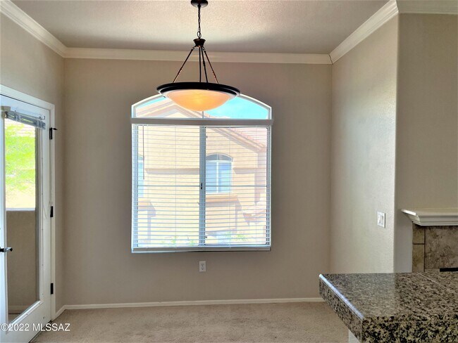 Building Photo - 7050 E Sunrise Dr