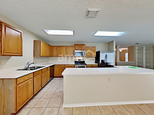 Building Photo - 18027 Redriver Song