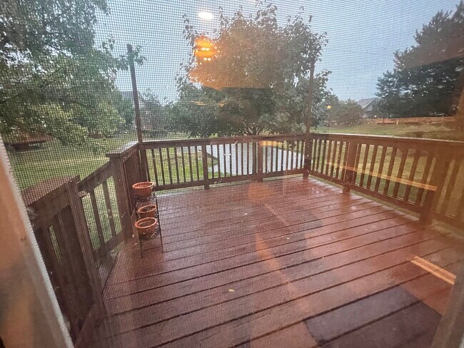 Deck with a pond view - 43105 Providence Ln