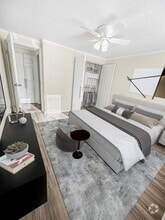 Relax in cozy bedrooms that offer plenty of storage and natural light, creating a perfect retreat at the end of the day. - Clubside Apartment Homes