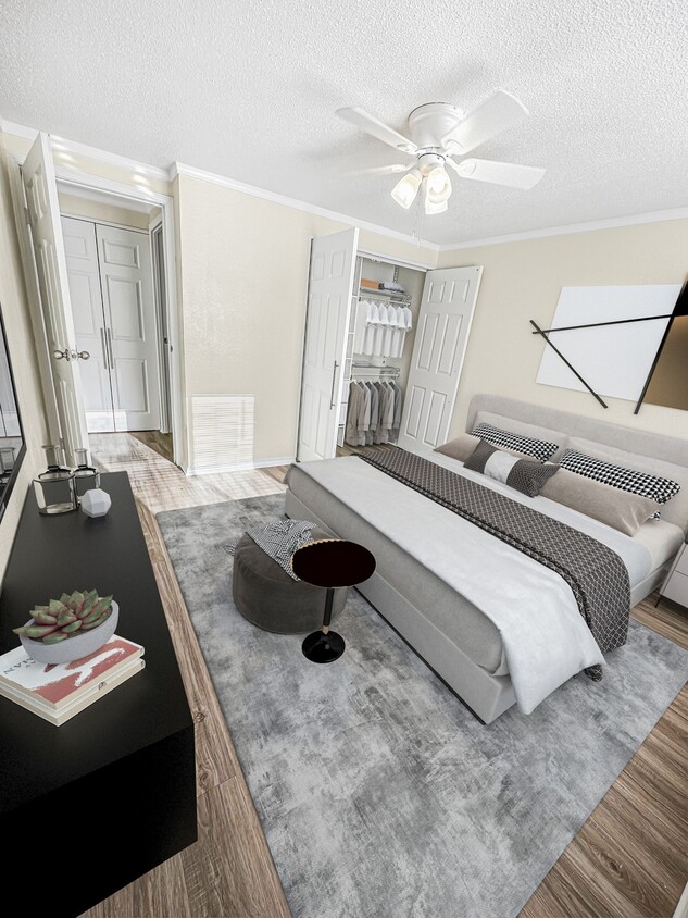 Relájese en acogedoras habitaciones que ofrecen mucho espacio de almacenamiento y luz natural, creando un refugio perfecto al final del día. - Clubside Apartment Homes