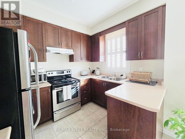 Building Photo - 7208 Triumph Ln