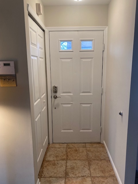 Facing entrace with coat closet to the left - 105 Hopkins Ct