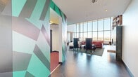 This striking clubhouse in Denver, CO is a masterfully designed social space that blends bold artistic expression with high-end functionality. The single-floor layout is generously proportioned, offering a variety of distinct zones that flow seamlessly from one to the next via a connecting hallway. Soaring double-height ceilings and expansive floor-to-ceiling windows flood the interior with natural light while framing panoramic views of the Denver skyline and surrounding landscape.

The main lounge area is a visual centerpiece, featuring eclectic furnishings in deep pinks, purples, and florals set against dramatic geometric murals in teal and charcoal. A sculptural black bubble coffee table, a curved white sofa, and bold accent chairs create a layered, gallery-like atmosphere. A teal-tiled fireplace surrounded by floor-to-ceiling bookshelves anchors a cozy library lounge, accented by an oversized eye artwork that commands attention.

The kitchen and dining area showcases a terrazzo island, a gold-accented tray ceiling, and a long communal dining table ideal for gatherings, all framed by sweeping outdoor views. Hexagonal tile flooring runs throughout, providing a cohesive design thread. Hanging greenery and sculptural plants add organic warmth to this thoughtfully curated, artistically immersive clubhouse.
