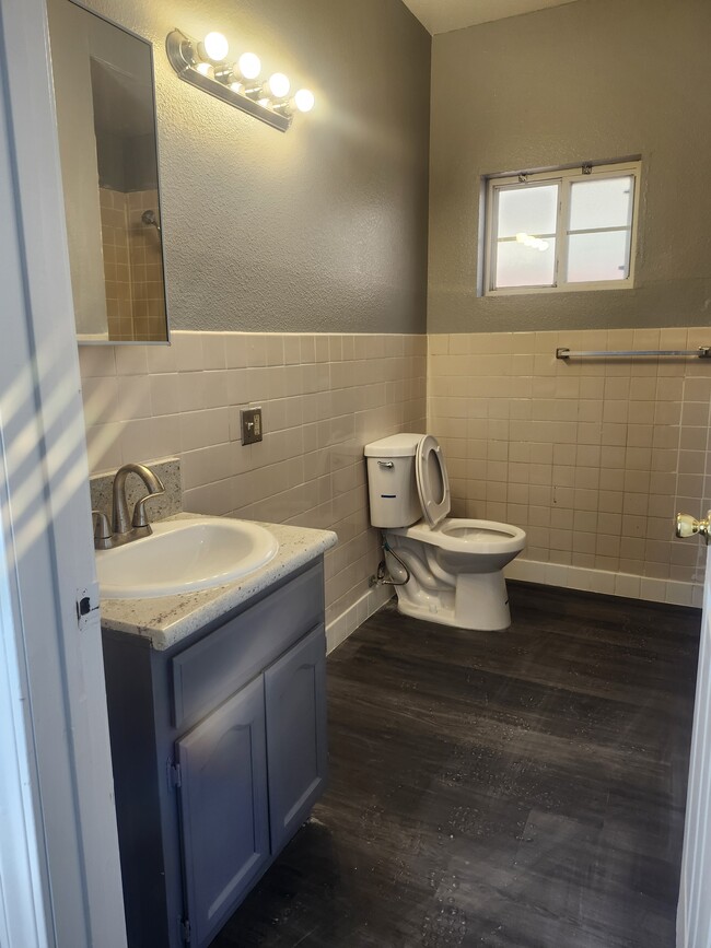 One of 2 full baths - 10609 S Main St
