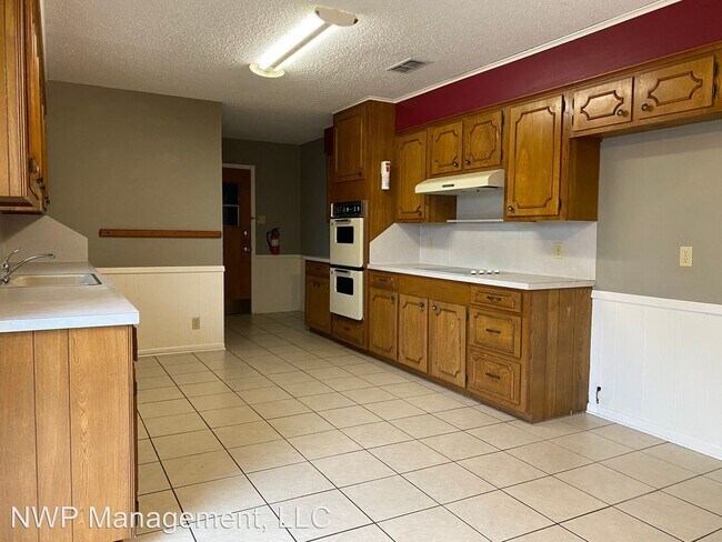Building Photo - 4 br, 2 bath House - 7404 Holly Oak Dr