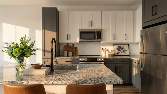 Granite counters and stainless steel appliances - Archer Eastfield Station