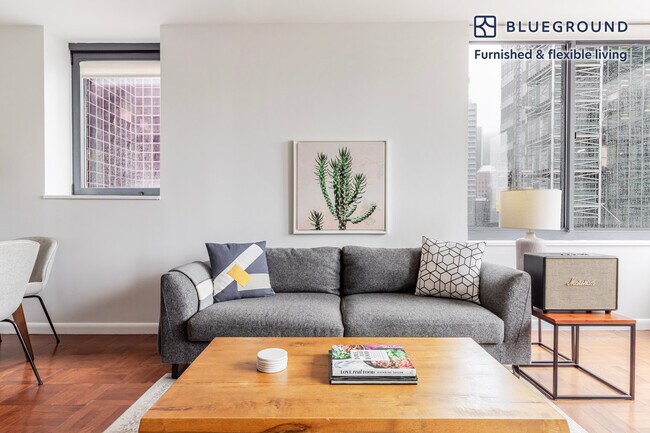 Foto del edificio - 235 W 48th St