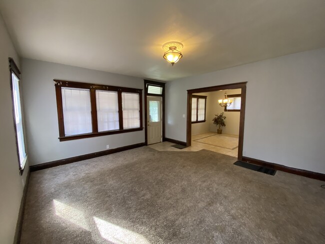 1st Floor: Living Room & Front Door - 124 Dewhurst St