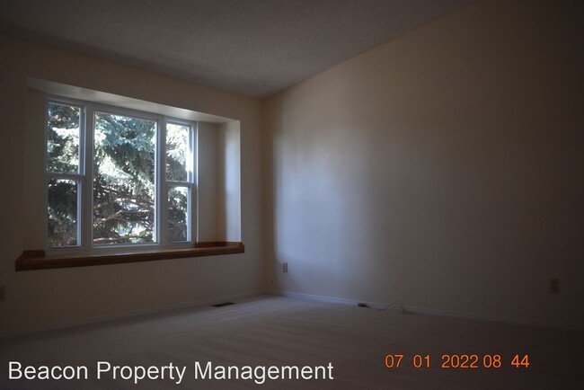 Building Photo - 3 br, 1 bath House - 8867 W. Toller Ave