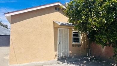 Building Photo - 1255 E 88th Pl