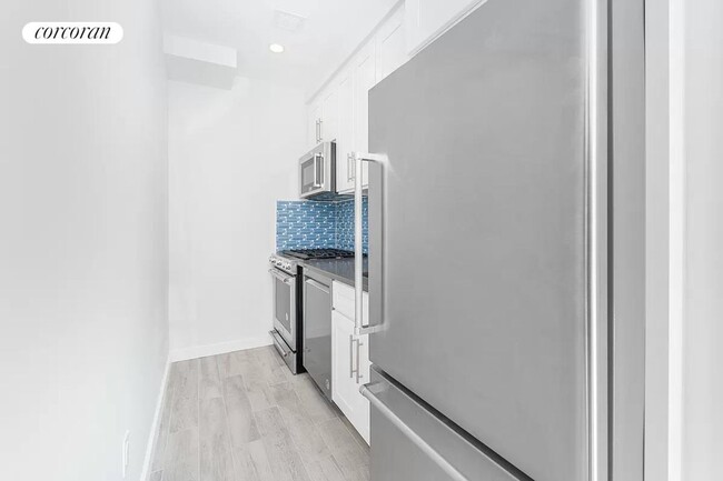 Building Photo - 14-11 31st Ave