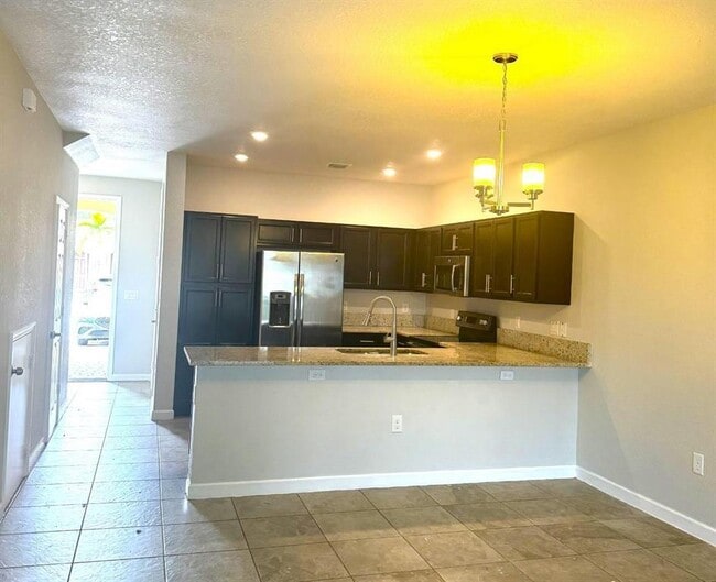 Building Photo - 5887 NW 56th Pl