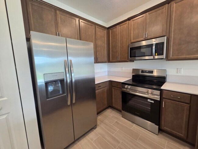 Foto del edificio - 5690 Divine Dr