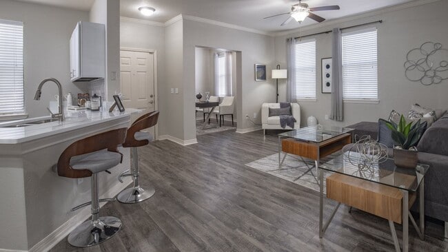 Modern Open Concept Living Room with Breakfast Bar and Wood-Style Flooring - Enders Place at Baldwin Park