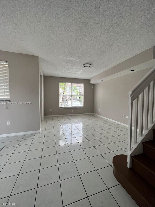 Building Photo - 3 br, 2.5 bath House - 8635 SW 152nd Ave A...