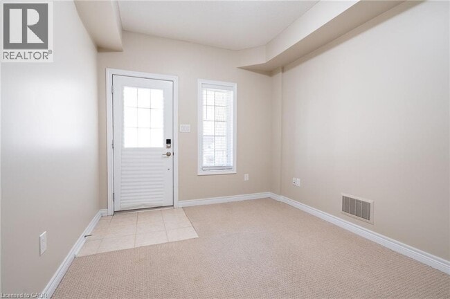 Photo du bâtiment - 1401 Plains Rd E