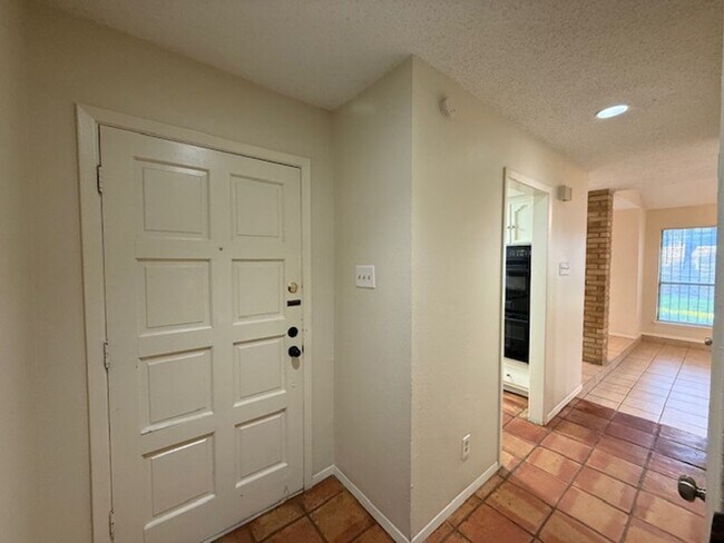 Foto del edificio - Quadrangle Townhome