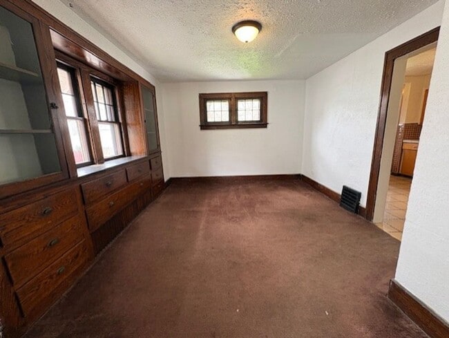 Building Photo - Spacious 4-Bedroom Akron Home with Charming Kitchen Nook & Backyard & Pet Friendly