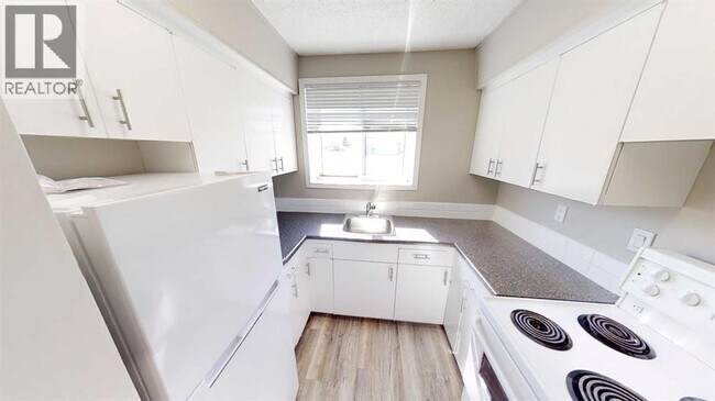 Photo du bâtiment - 10802-10899 99 St