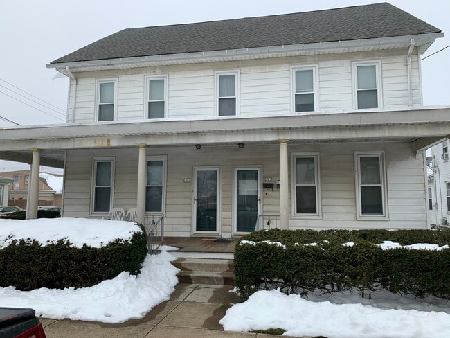 Corner lot, plenty of parking - 201 E Cherry St