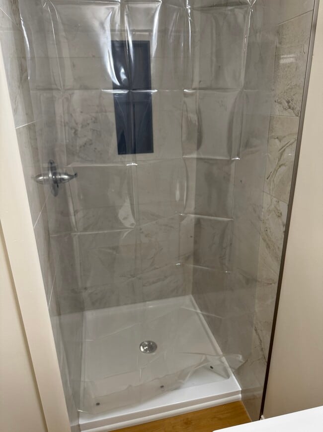 Tile - 418 N Broadway St