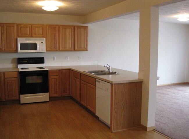 Building Photo - Renter's Dream with Triple Car Garage