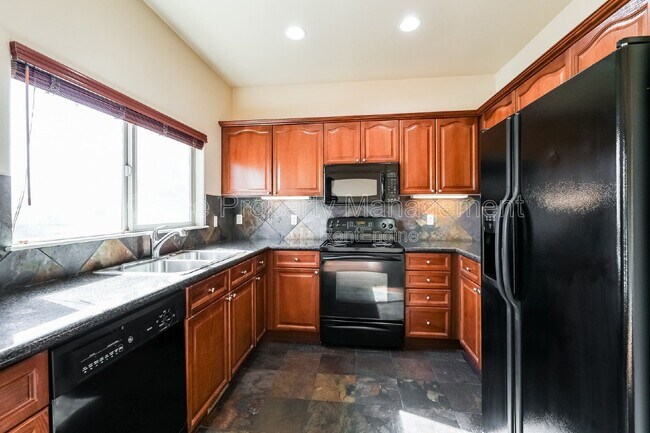 Foto del edificio - 3155 E 104th Ave