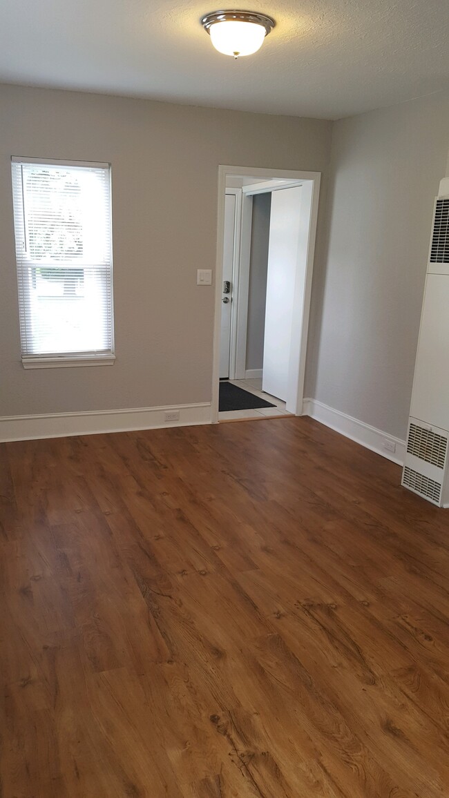 Living room facing entry way - 133 Muir Rd