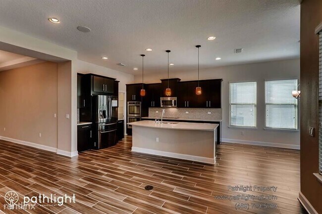 Foto del edificio - 4 br, 3.5 bath House - 710 116th Court Nor...