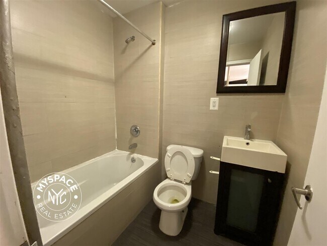 Foto del edificio - 49 Menahan St