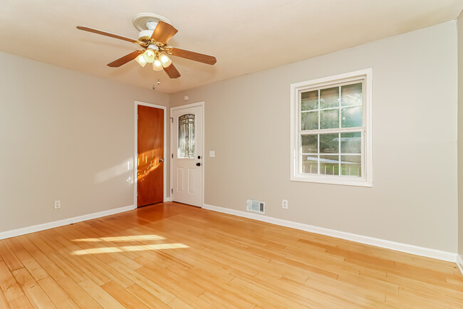 Building Photo - Bright Interiors & Spacious Backyard