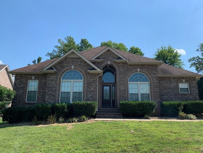 Building Photo - Luxury Living! Beautiful Brick Home in Sango with 3 car garage.
