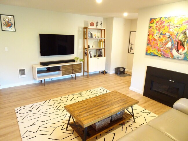 Building Photo - Modern Urban Living with Stunning Views at...