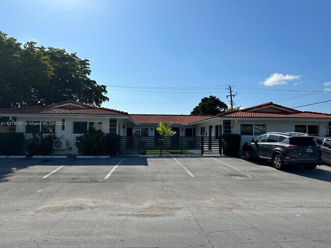 Building Photo - 1750 NE 56th Ct