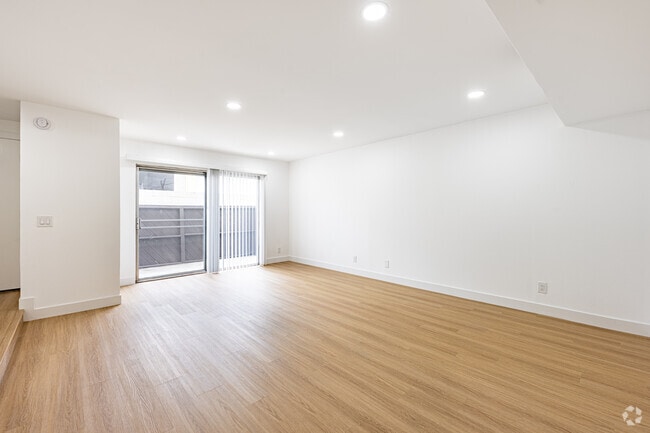2 habitaciones, 3 baños - 1232 pies cuadrados - Sala de estar - Peerless Building Corp.